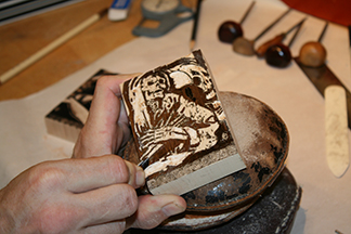 George working on engravings for the Valdemar book